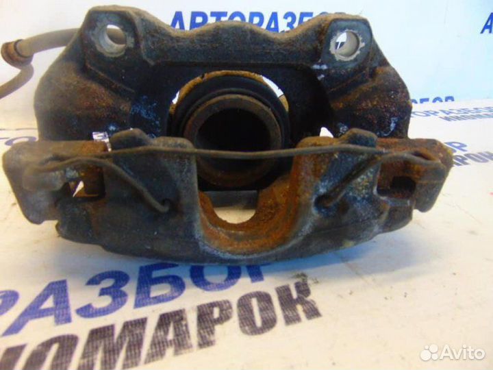 Суппорт тормозной передний левый Opel Astra H