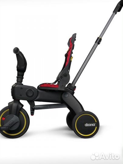 Детский велосипед с ручкой doona