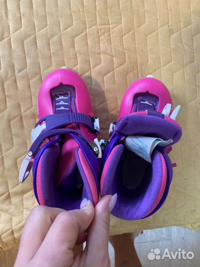 Роликовые коньки