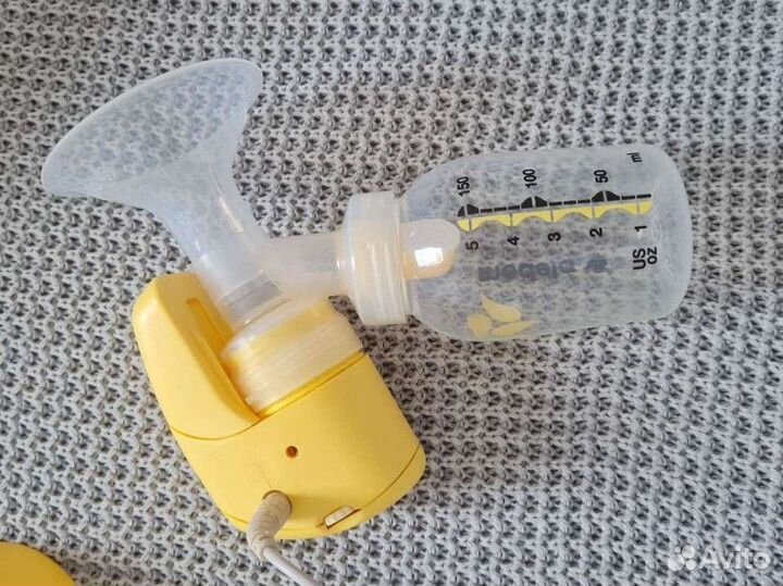 Молокоотсос medela электрический