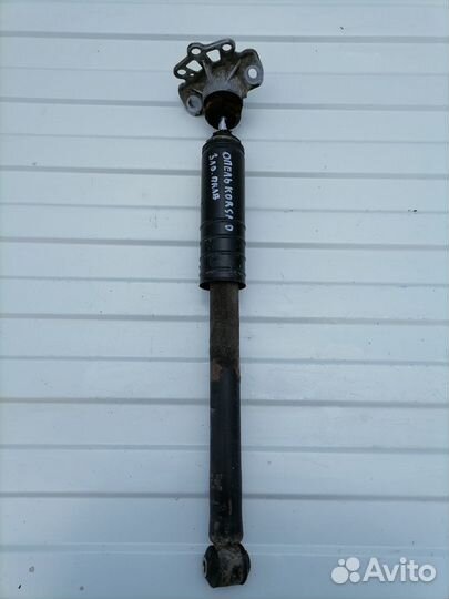 Амортизатор задний стойка Опель Корса Д Corsa D
