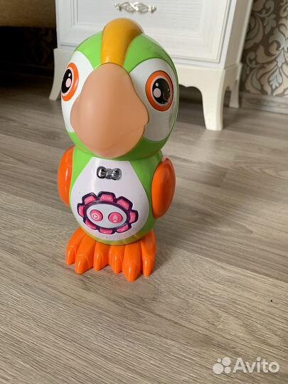 Развивающая игрушка музыкальный попугай