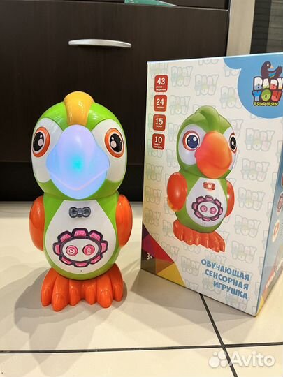 Игрушка попугай