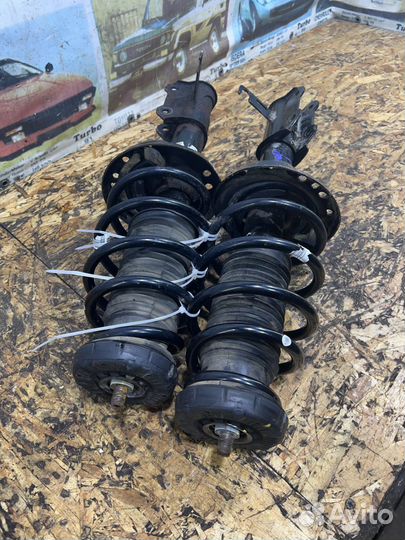 Стойки амортизаторы перед Опель Астра J