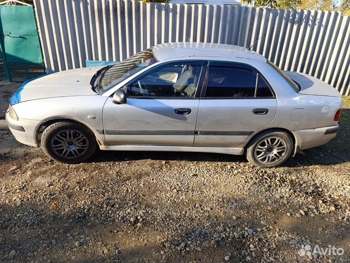 Mitsubishi Carisma 1.8 МТ, 2002, 35 555 км