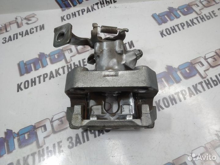 Суппорт задний левый Toyota Corolla 150