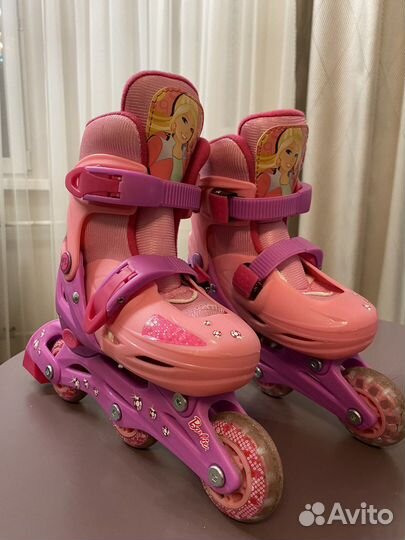 Роликовые коньки