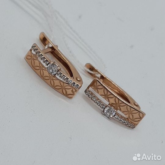 Золотые серьги с камнем