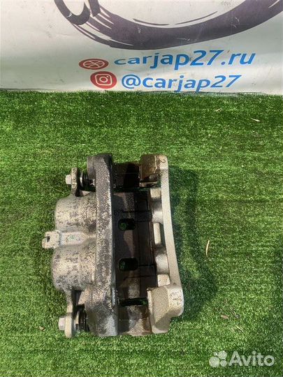 Суппорт тормозной (6) передний левый Nissan