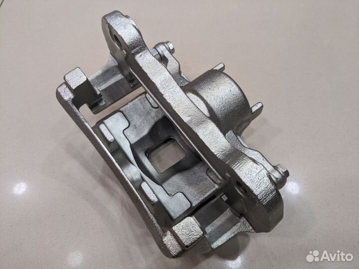 Суппорт передний правый mitsubishi L200 (05)