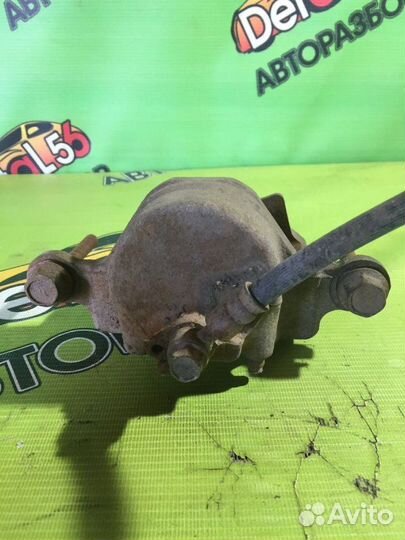 Суппорт тормозной Nissan Vanette SK