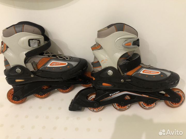 Роликовые коньки