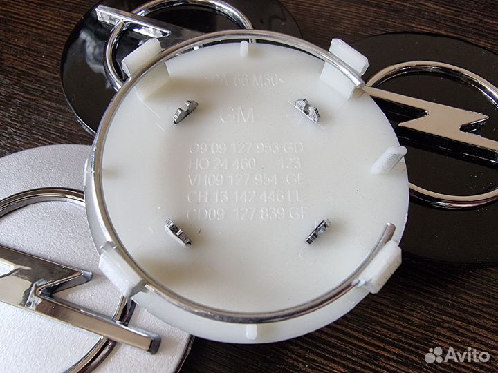 Колпачки на литые диски Opel 64мм серебро/черный