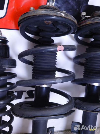 Стойки амортизатора Mitsubishi Outlander XL