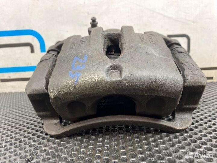 Суппорт передний левый Kia Sportage 3