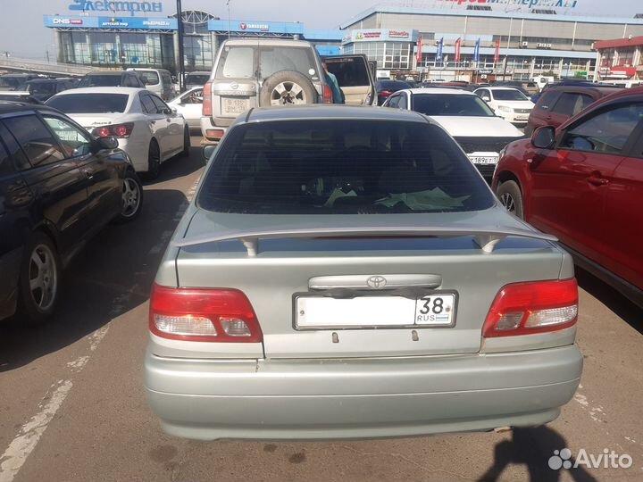 Спойлер Toyota Carina 210