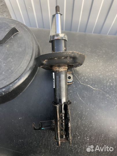 Амортизатор передний левый Opel Astra J