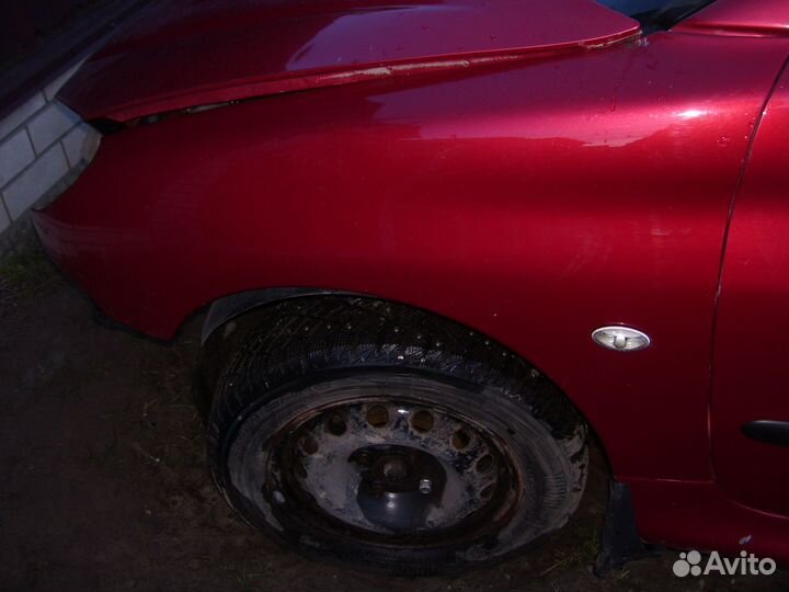 Пежо 206 крыло левое