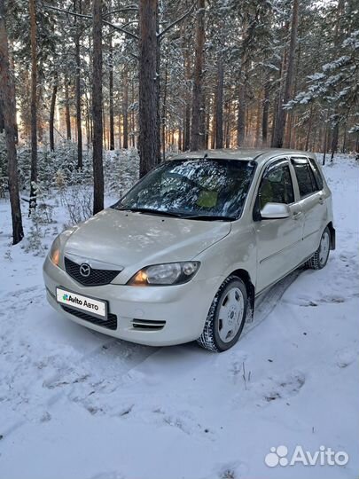 Mazda Demio 1.3 AT, 2003, 194 235 км