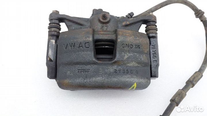 Суппорт тормозной передний левый Skoda Octavia A8