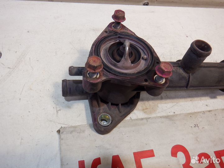 Фланец Корпус термостата Kia Picanto G4HE