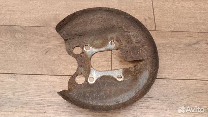 Пыльник тормозного диска задний левый Peugeot 308