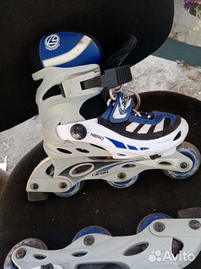 Роликовые коньки