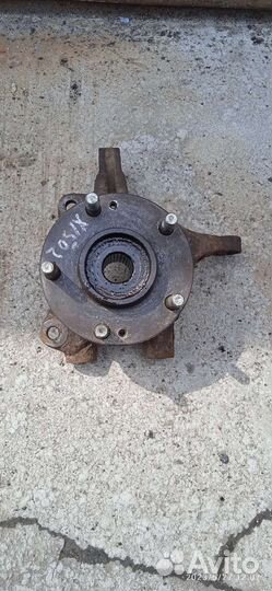 Kia sportage 2 левый передний поворотный кулак