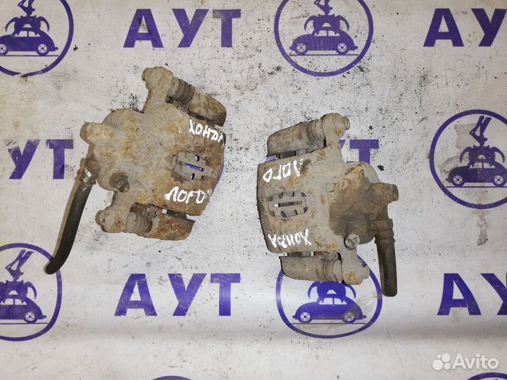 Суппорт передний левый правый Рено Логан 1