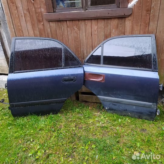 Двери на мицубиси каризма седан рестайл