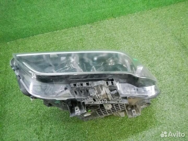 Фара левая BMW X1