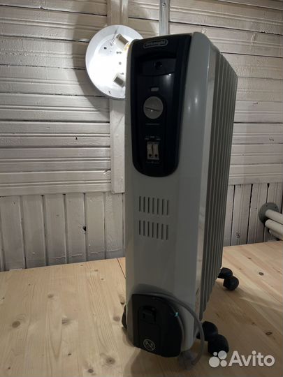 Масляный обогреватель delonghi