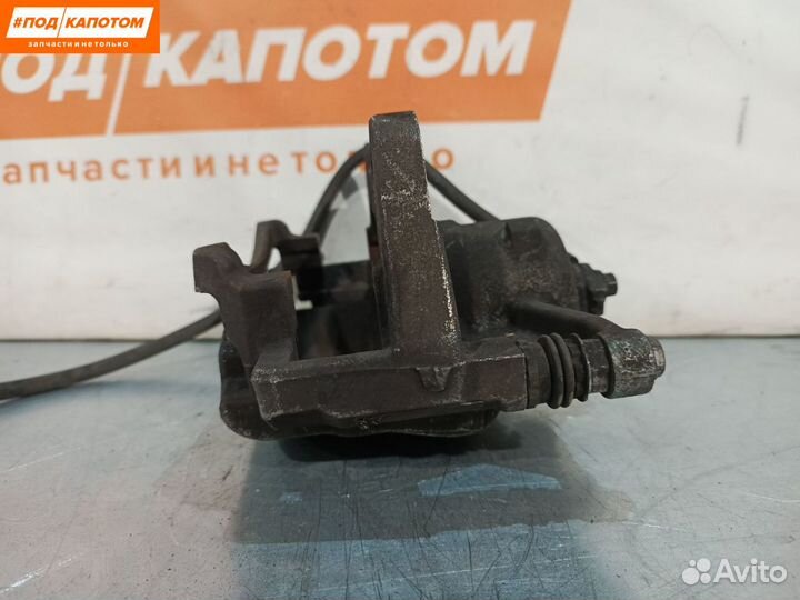 Суппорт тормозной передний левый Volkswagen Tiguan