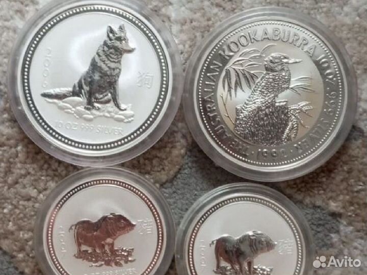 Монеты серебряные 10 и 5 унций