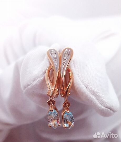 Золотые серьги с бриллиантом