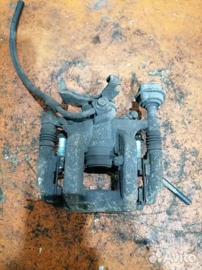 Суппорт тормозной задний правый Opel Mokka