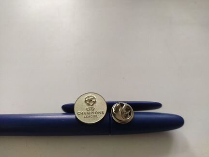 Ручка и значок Лиги Чемпионов